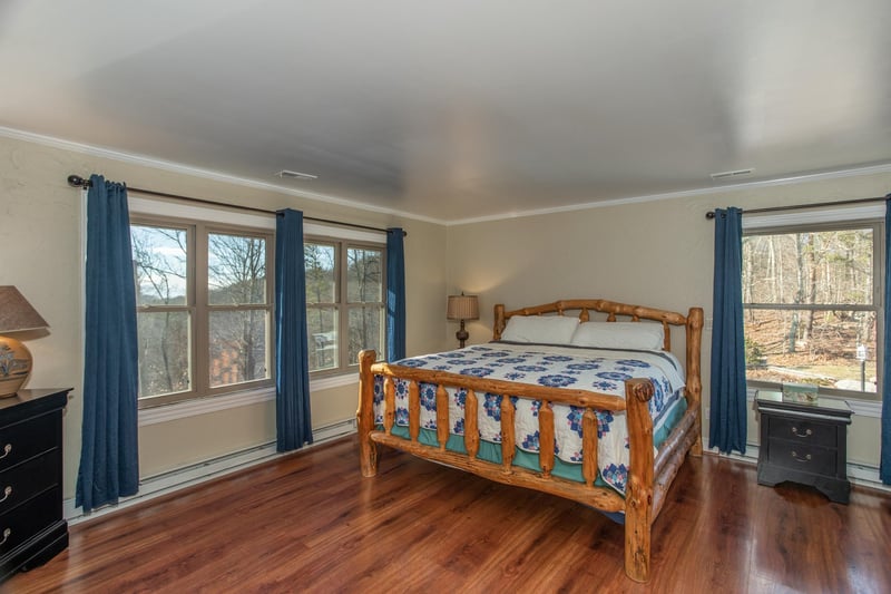 Bedroom with a log bed at Best View Ever A 5 bedroom cabin rental in Pigeon Forge