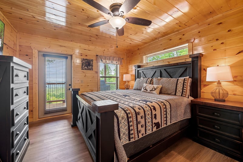 Bedroom With Deck Entry at Heavenly Haven