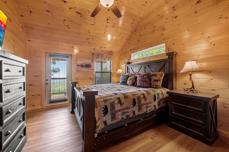 Bedroom With Deck Entry at Heavenly Haven