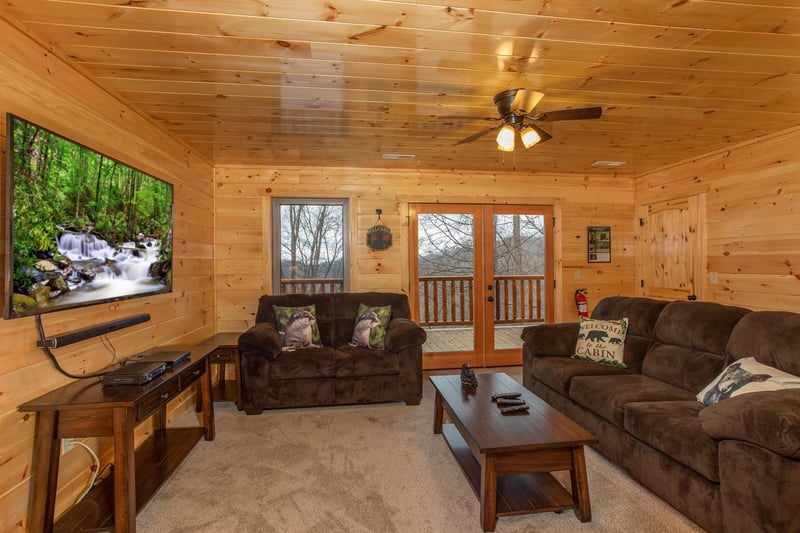 Media room on the lower floor at Happy Bears Hideaway, a 2 bedroom cabin rental located in Gatlinburg