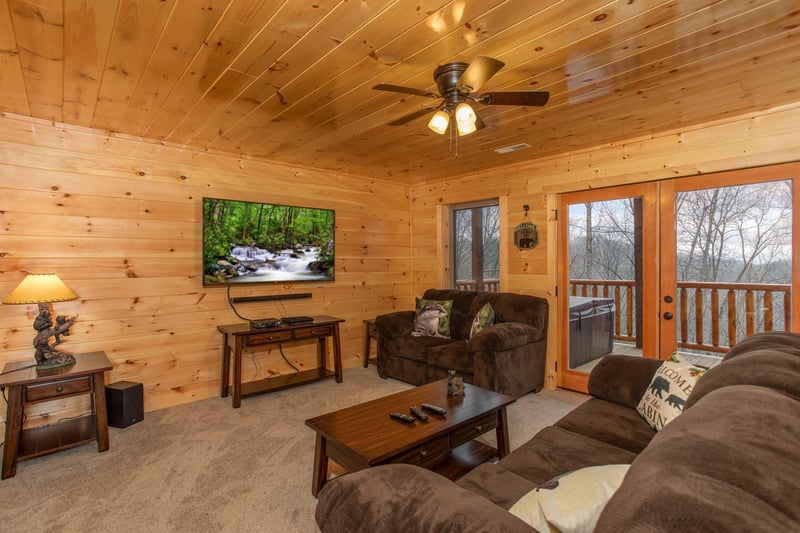 Media room on the lower floor at Happy Bears Hideaway, a 2 bedroom cabin rental located in Gatlinburg