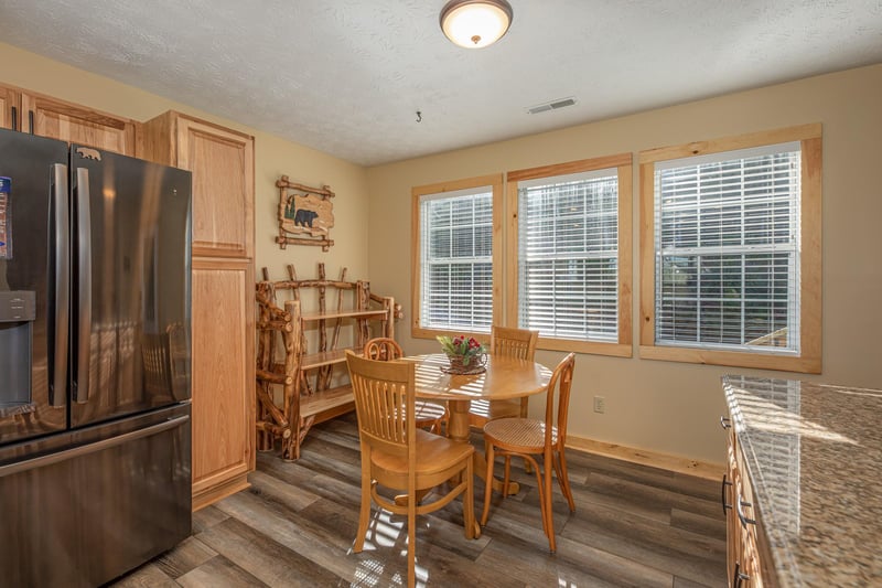 Bistro set in the kitchen at Le Bear Chalet, a 7 bedroom cabin rental located in Gatlinburg