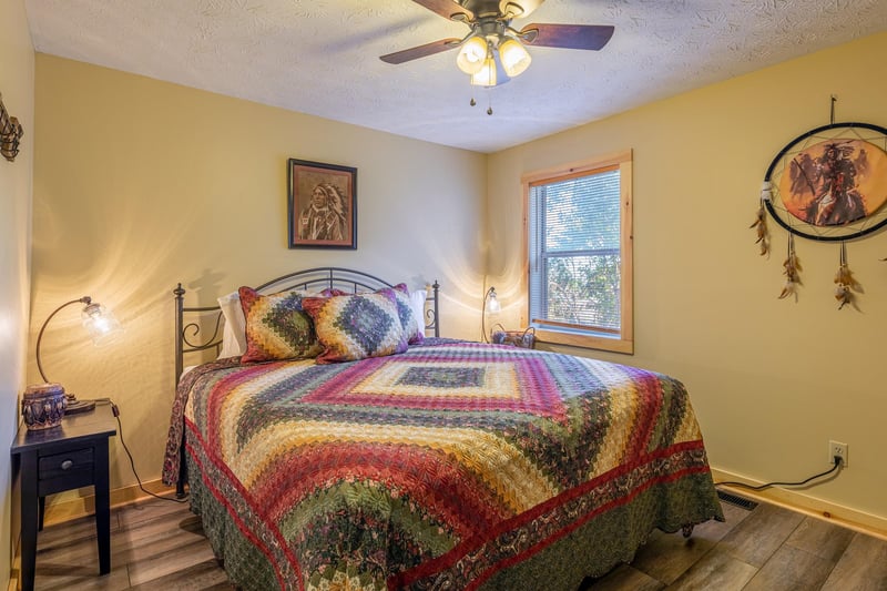 Bedroom with two night stands and two lamps at Le Bear Chalet, a 7 bedroom cabin rental located in Gatlinburg