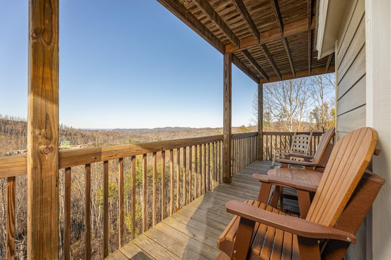 Adirondack chairs on the deck at Le Bear Chalet, a 7 bedroom cabin rental located in Gatlinburg