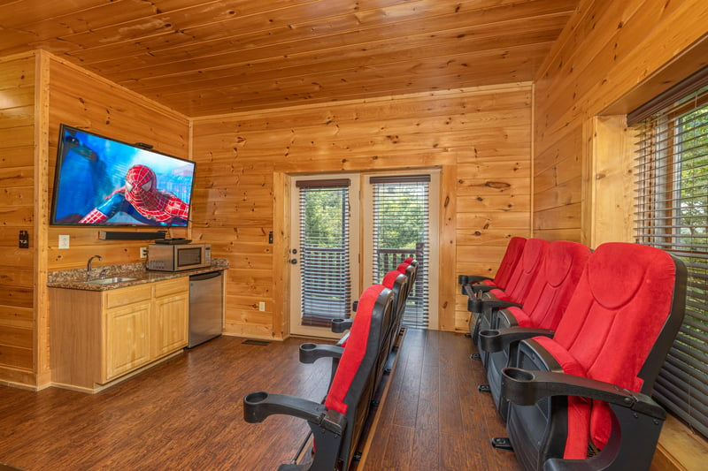 Kitchenette and theater at Loving Every Minute, a 5 bedroom cabin rental located in Pigeon Forge