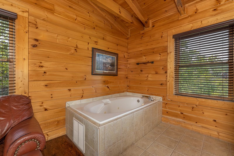 Jacuzzi in master bedroom at Loving Every Minute, a 5 bedroom cabin rental located in Pigeon Forge