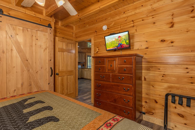 TV in king room at Loving Every Minute, a 5 bedroom cabin rental located in Pigeon Forge