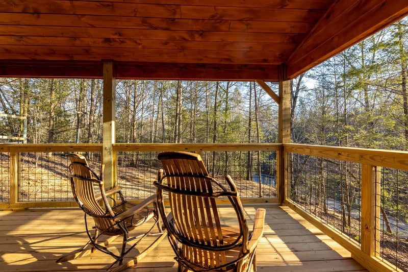 Wooded porch views at Bessy Bears Cabin, a 2 bedroom cabin rental located inGatlinburg