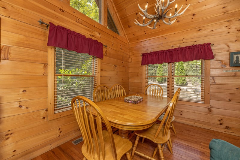 Dining table for six at Cubs Crossing, a 3 bedroom cabin rental located in Gatlinburg