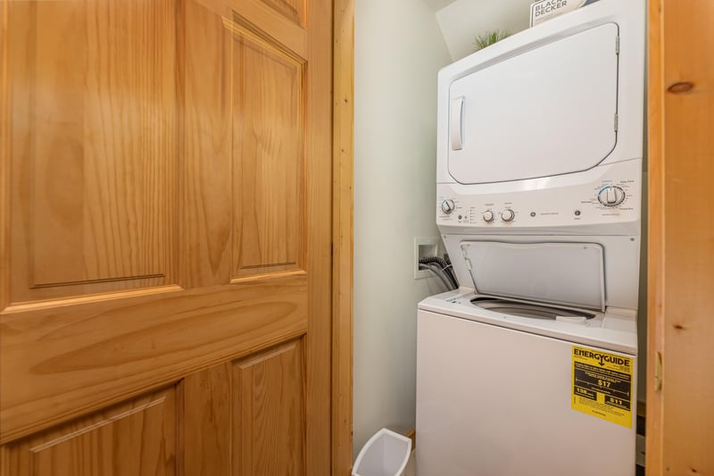 Stacked washer and dryer at Cubs Crossing, a 3 bedroom cabin rental located in Gatlinburg