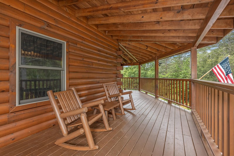 Rocking Chairs on Covered Deck at Almost Bearadise, a 4 bedroom cabin rental located in Pigeon Forge