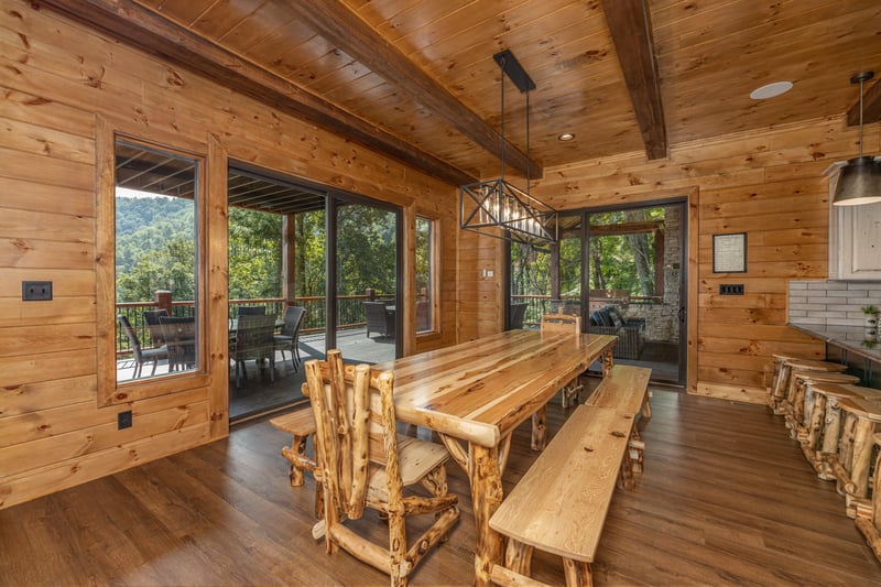 Large dining table at Black Bears  Biscuits Lodge, a 6 bedroom cabin rental located in Pigeon Forge