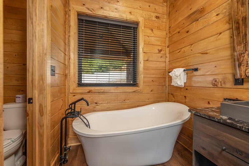 Soaker tub in a bathroom at Black Bears  Biscuits Lodge, a 6 bedroom cabin rental located in Pigeon Forge