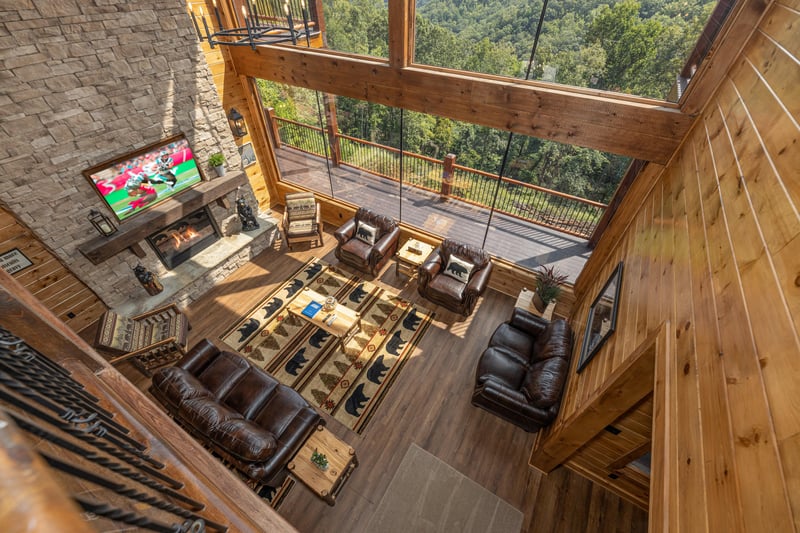 Looking down at the living room at Black Bears  Biscuits Lodge, a 6 bedroom cabin rental located in Pigeon Forge