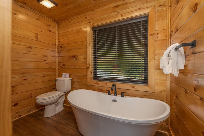 Soaker tub in a bathroom at Black Bears  Biscuits Lodge, a 6 bedroom cabin rental located in Pigeon Forge