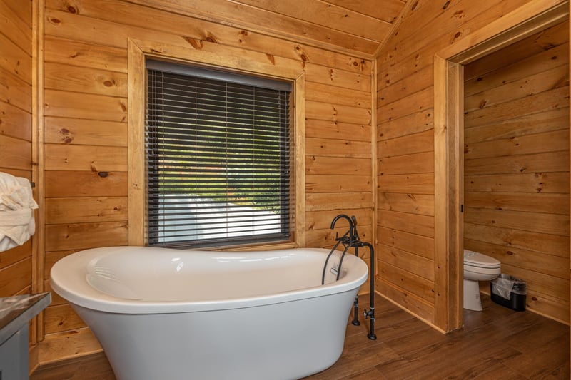 Soaker tub in a bathroom at Black Bears  Biscuits Lodge, a 6 bedroom cabin rental located in Pigeon Forge