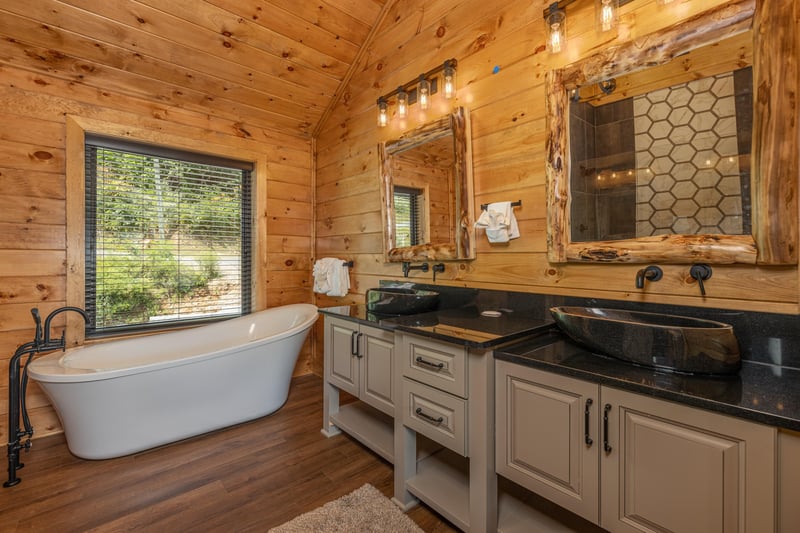 Bathroom with soaker tub and double vanity sinks at Black Bears  Biscuits Lodge, a 6 bedroom cabin rental located in Pigeon Forge