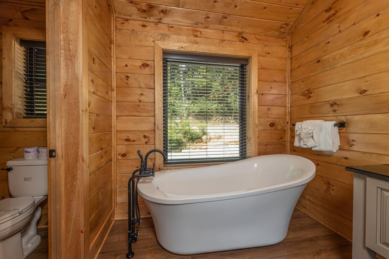 Soaker tub in a bathroom at Black Bears  Biscuits Lodge, a 6 bedroom cabin rental located in Pigeon Forge