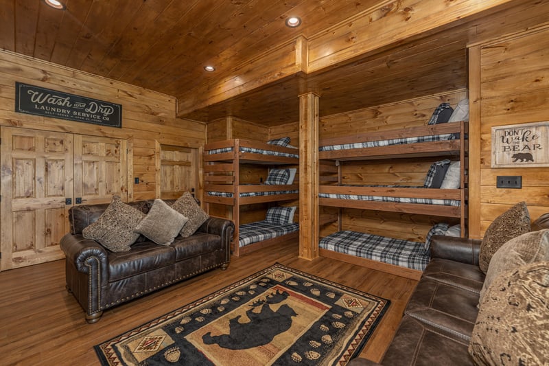 Bunks in the lower level at Black Bears  Biscuits Lodge, a 6 bedroom cabin rental located in Pigeon Forge