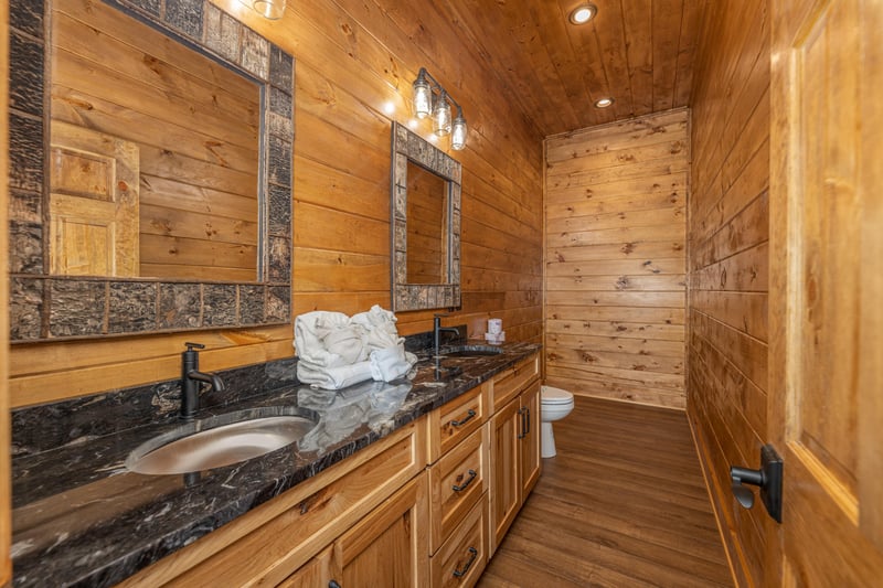 Bathroom with double vanity sink at Black Bears  Biscuits Lodge, a 6 bedroom cabin rental located in Pigeon Forge