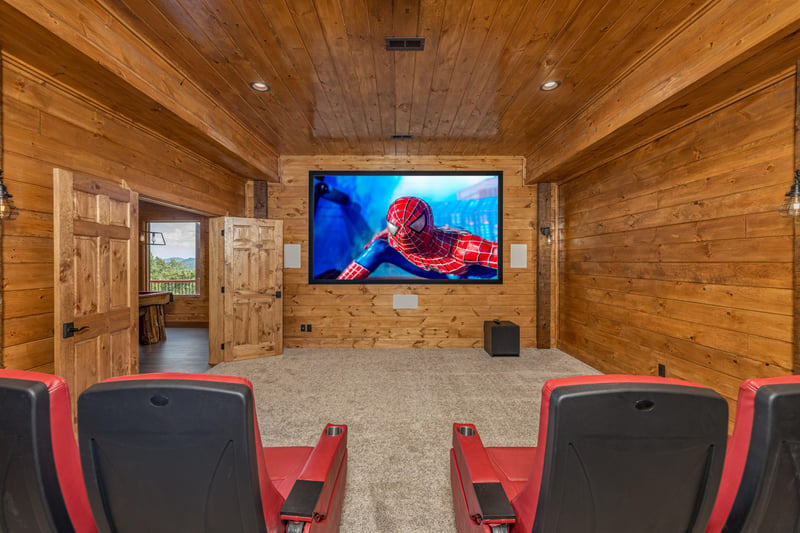 Home theater with seating for 18 at Black Bears  Biscuits Lodge, a 6 bedroom cabin rental located in Pigeon Forge