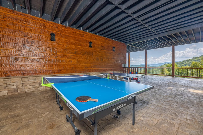 Outdoor ping pong table at Black Bears  Biscuits Lodge, a 6 bedroom cabin rental located in Pigeon Forge