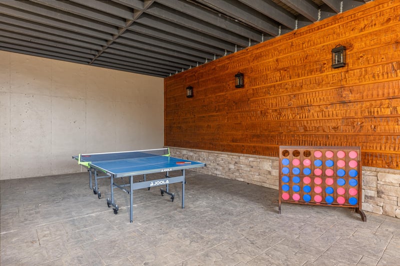 Ping pong and connect four at black bears  biscuits lodge a 6 bedroom cabin rental located in pigeon forge