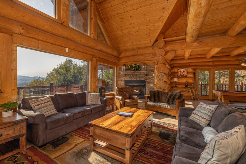 Seating in the living room at Grizzlys Den, a 5 bedroom cabin rental located in Gatlinburg